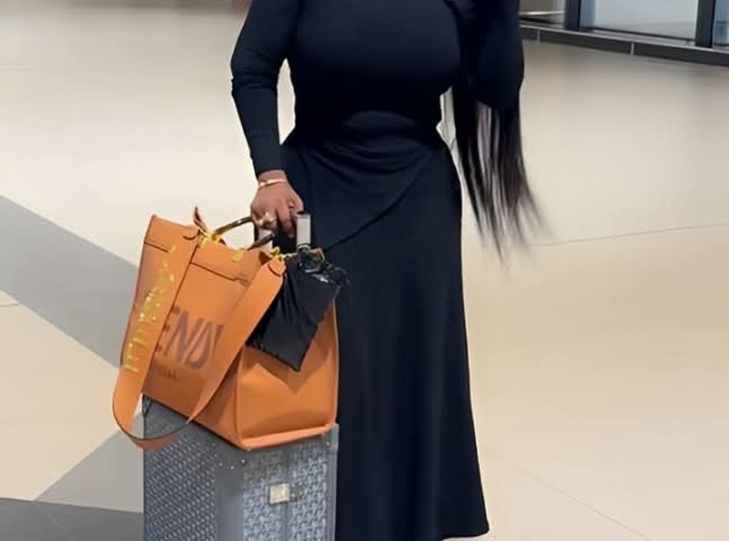 Nana Ama McBrown stuns at KIA with Goyard suitcase and Fendi tote in viral travel moment